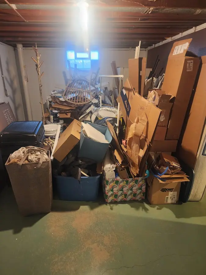 Roll-off dumpster container at job site for Construction Dumpster Rental in Edgewater